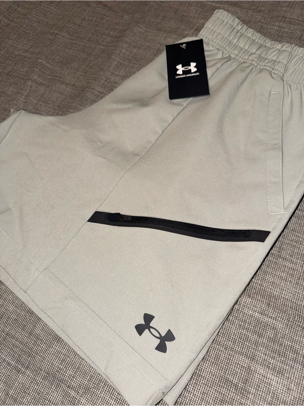 Under Armour Men’s Light Grey Athletic Shorts with Black Accents